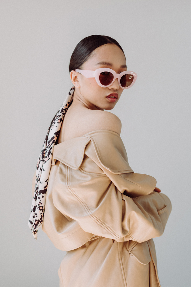 Stylish Woman in Coat, Scarf and Sunglasses